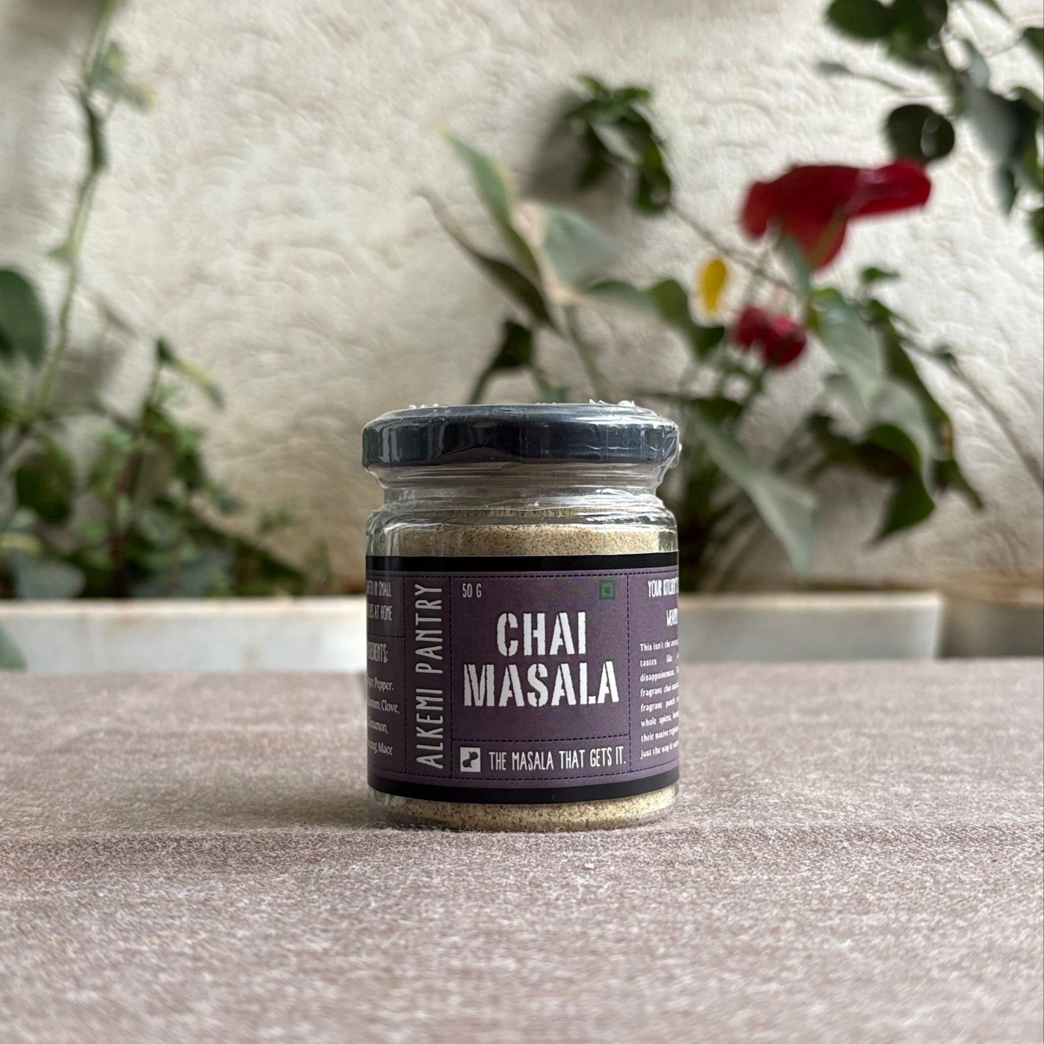 Jar of homemade 'Chai Masala' by Alkemi Pantry with ground spices made in small batches 